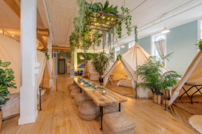 Experience Stay at the Glamping Loft Lake Geneva - Group Stays - 12 Stylish Tent Suites - Kitchen & Bar